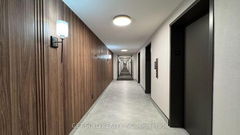 Photo 2 at 405 - 120 Dundalk Drive, Dorset Park, Toronto