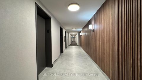 Photo 3 at 405 - 120 Dundalk Drive, Dorset Park, Toronto