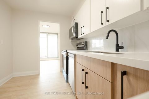 Photo 7 at 405 - 120 Dundalk Drive, Dorset Park, Toronto