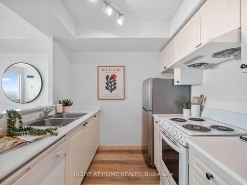 Photo 3 at 2013 - 18 Lee Centre Drive, Woburn, Toronto