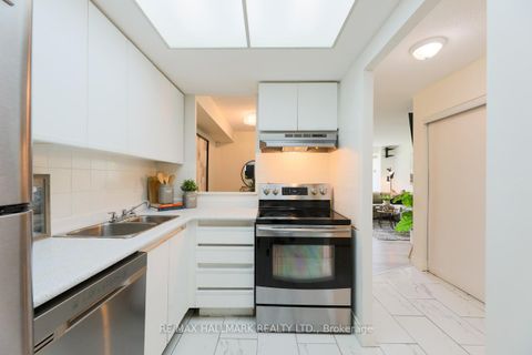 Photo 3 at 385 - 1 Greystone Walk Drive, Kennedy Park, Toronto