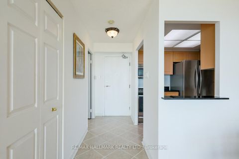 Photo 2 at 2027 - 3 Greystone Walk Drive, Kennedy Park, Toronto