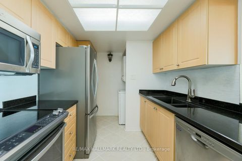 Photo 3 at 2027 - 3 Greystone Walk Drive, Kennedy Park, Toronto