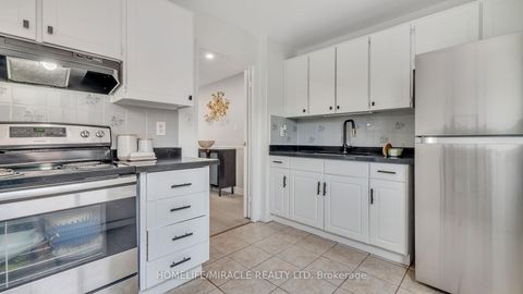 Photo 1 at 54 - 91 Muir Drive, Scarborough Village, Toronto