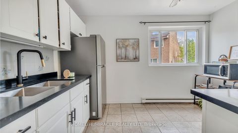 Photo 10 at 54 - 91 Muir Drive, Scarborough Village, Toronto