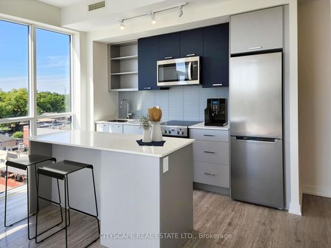 Photo 1 at 608 - 2300 St Clair Avenue W, Junction Area, Toronto