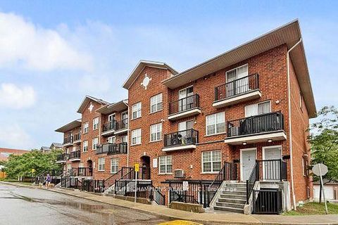 Photo 1 at 304 - 35 Strangford Lane S, Birchmount, Toronto