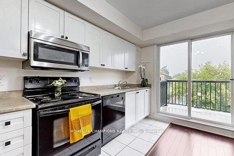 Photo 11 at 304 - 35 Strangford Lane S, Birchmount, Toronto