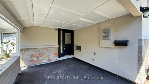 Photo 2 at 28 Orton Park Road, Woburn, Toronto