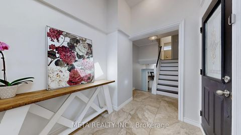 Photo 3 at 28 Orton Park Road, Woburn, Toronto