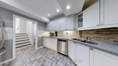 Photo 10 at 28 Orton Park Road, Woburn, Toronto