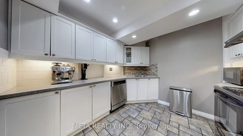 Photo 11 at 28 Orton Park Road, Woburn, Toronto