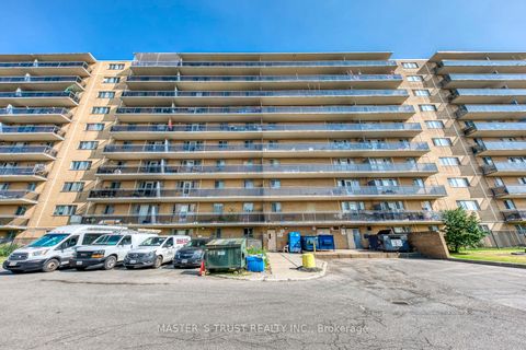 Photo 1 at 214 - 100 Dundalk Drive N, Dorset Park, Toronto