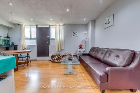 Photo 2 at 214 - 100 Dundalk Drive N, Dorset Park, Toronto