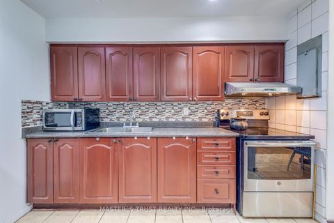 Photo 7 at 214 - 100 Dundalk Drive N, Dorset Park, Toronto