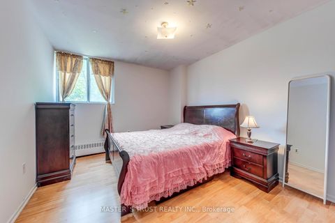 Photo 8 at 214 - 100 Dundalk Drive N, Dorset Park, Toronto