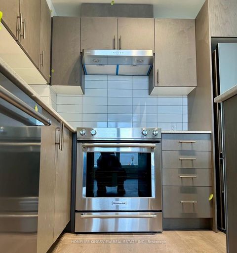 Photo 2 at 223 - 9000 JANE Street, Vellore Village, Vaughan