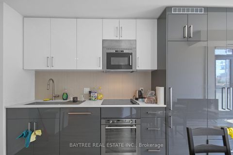 Photo 1 at 613 - 840 St Clair Avenue W, Oakwood Village, Toronto