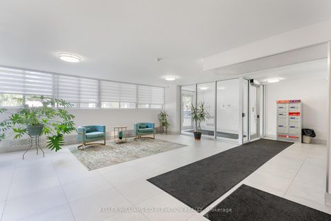 Photo 1 at 202 - 11 Neilson Drive, Markland Wood, Toronto