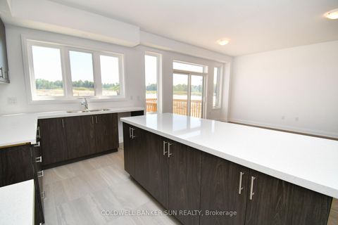 Photo 11 at 3 Gateway Drive, Rural Barrie Southeast, Barrie