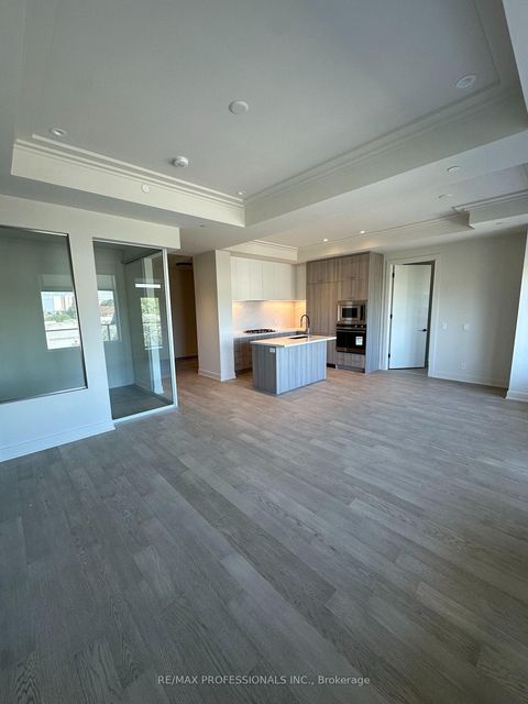 Photo 1 at 410 - 123 Maurice Drive, CO Central, Oakville