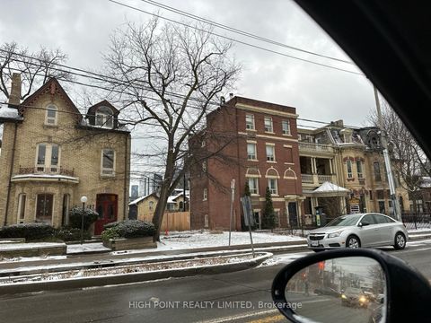 Photo 1 at 185 Gerrard Street E, Moss Park, Toronto