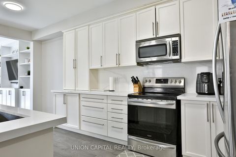 Photo 7 at 136 Mistywood Crescent, Patterson, Vaughan