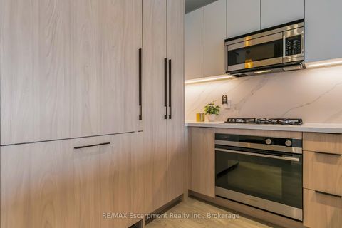 Photo 7 at 205 - 123 Maurice Drive, CO Central, Oakville