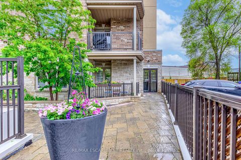 Photo 1 at 401 - 70 Stewart Street, CO Central, Oakville