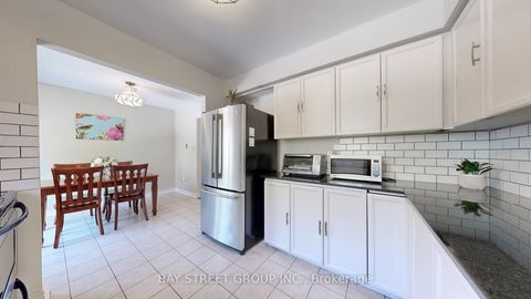 Photo 11 at 30 - 25 Cardwell Avenue, Malvern West, Toronto