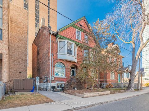 Photo 1 at 74 Homewood Avenue, South St. James Town, Toronto