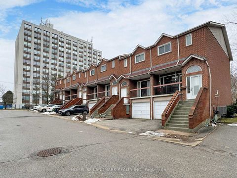 Photo 1 at 7 - 10 Reidmount Avenue, Malvern West, Toronto