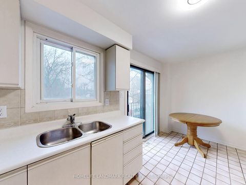 Photo 17 at 7 - 10 Reidmount Avenue, Malvern West, Toronto