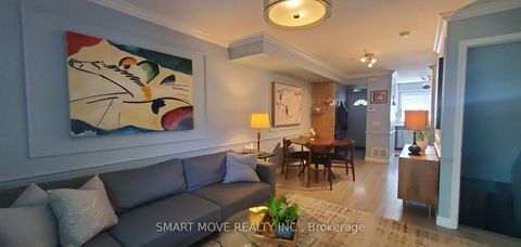 Photo 4 at TH 25 - 21 Replin Road, Lawrence, Toronto