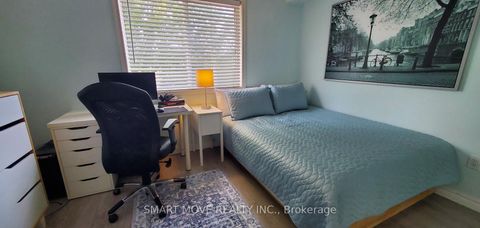 Photo 11 at TH 25 - 21 Replin Road, Lawrence, Toronto
