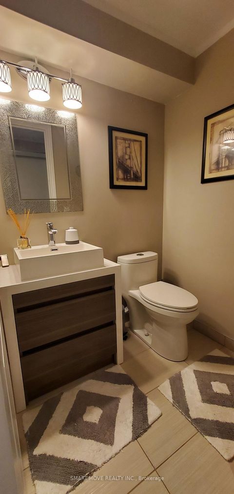 Photo 22 at TH 25 - 21 Replin Road, Lawrence, Toronto