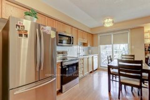 Photo 2 at 8 - 37 Four Winds Drive, York University Heights, Toronto