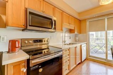 Photo 4 at 8 - 37 Four Winds Drive, York University Heights, Toronto