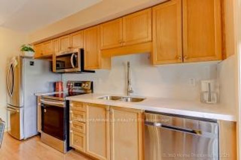 Photo 7 at 8 - 37 Four Winds Drive, York University Heights, Toronto