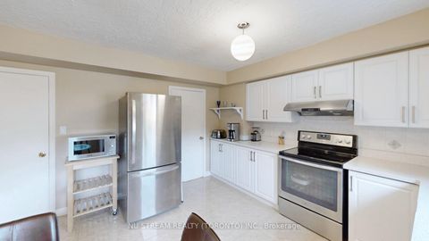Photo 11 at 65 Clansman Boulevard, Hillcrest Village, Toronto