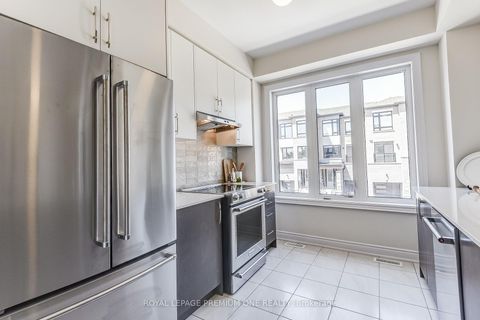 Photo 16 at 71 TENNANT Circle N, Vellore Village, Vaughan