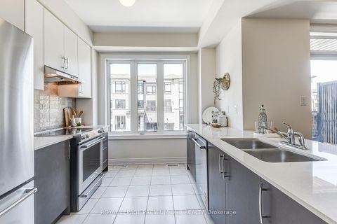 Photo 17 at 71 TENNANT Circle N, Vellore Village, Vaughan
