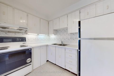 Photo 11 at 71 Jenny Wren Way, Hillcrest Village, Toronto