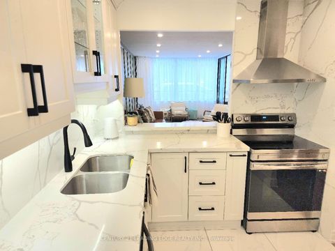 Photo 4 at 102 - 55 Bamburgh Circle, Steeles, Toronto