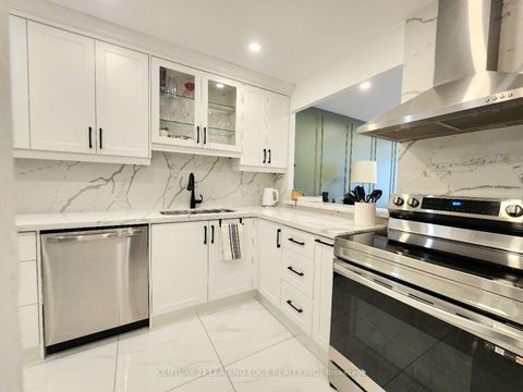 Photo 5 at 102 - 55 Bamburgh Circle, Steeles, Toronto