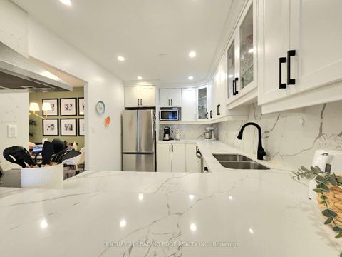 Photo 6 at 102 - 55 Bamburgh Circle, Steeles, Toronto