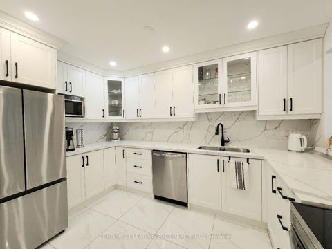 Photo 7 at 102 - 55 Bamburgh Circle, Steeles, Toronto
