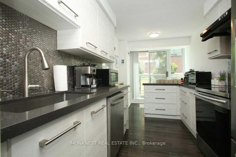 Photo 4 at 210 - 68 Grangeway Avenue, Woburn, Toronto