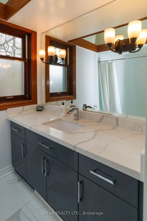 Photo 11 at 136 Humbercrest Boulevard, Bloor West Village, Toronto