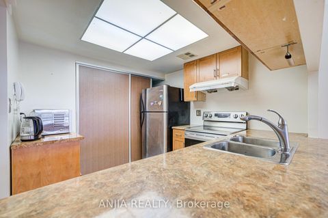 Photo 9 at 512 - 225 Bamburgh Circle, Steeles, Toronto